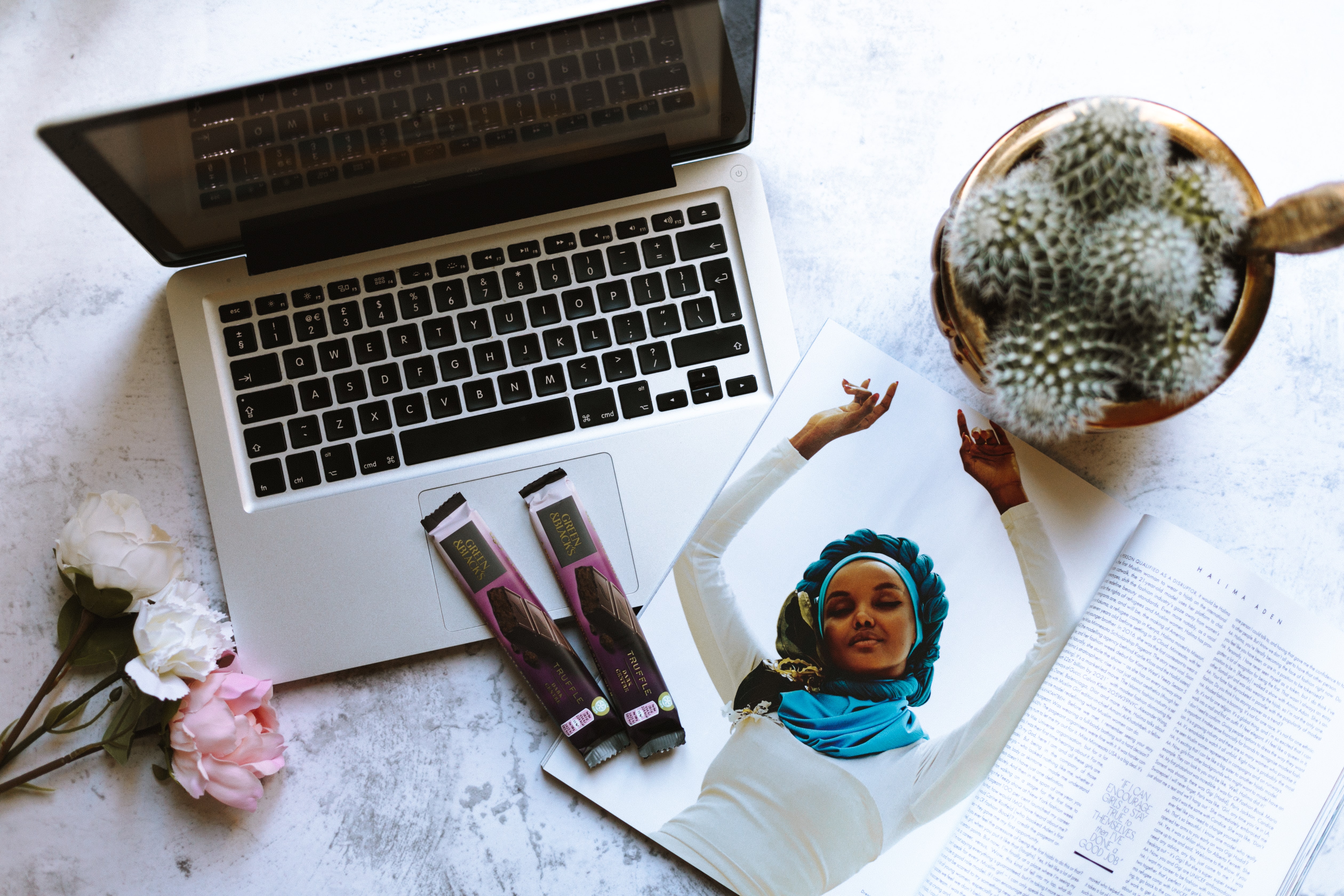 laptop and fashion mag contact